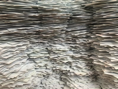 paper stacked in piles